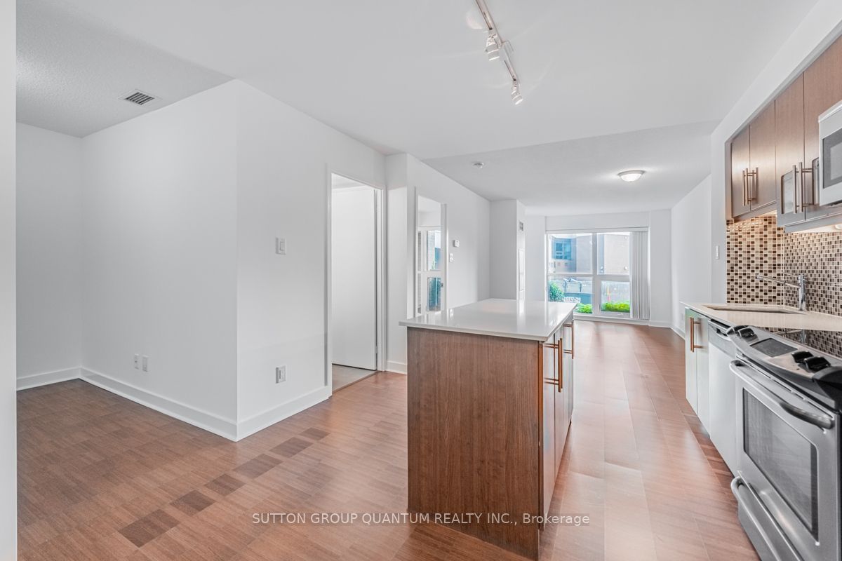 1169 Queen St W, #203