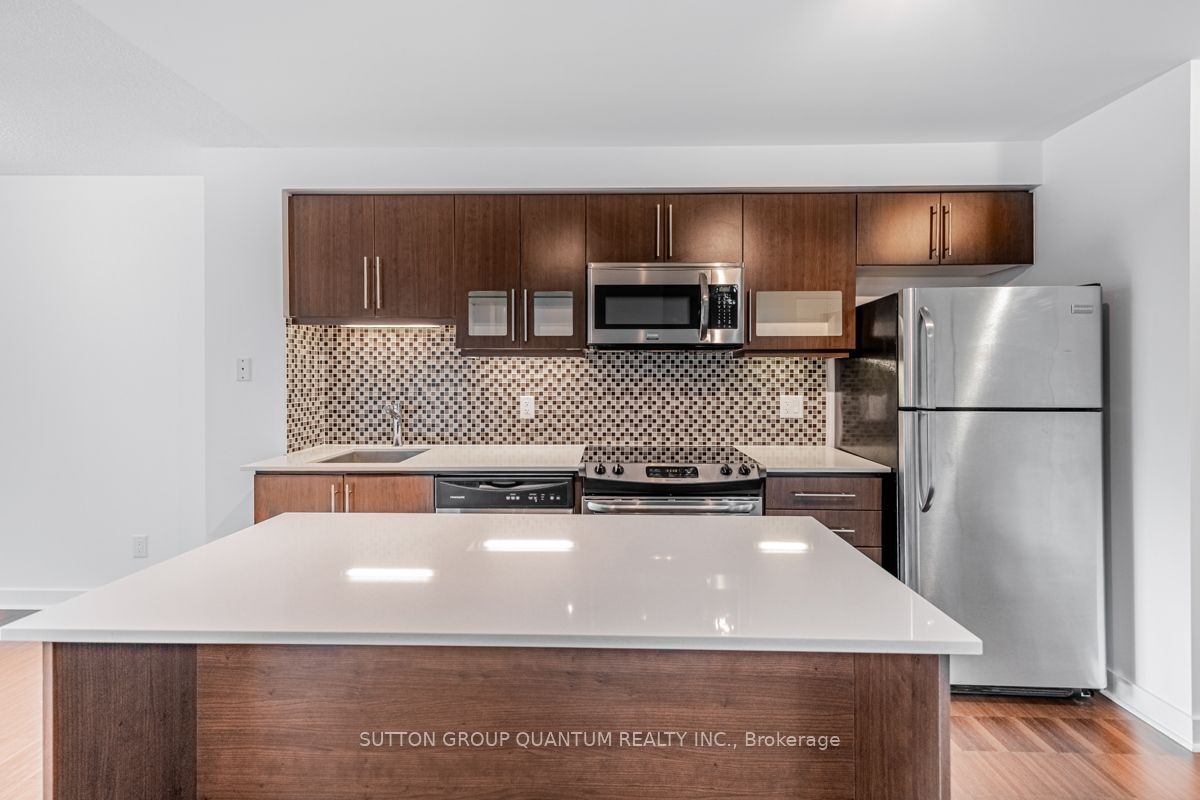 1169 Queen St W, #203