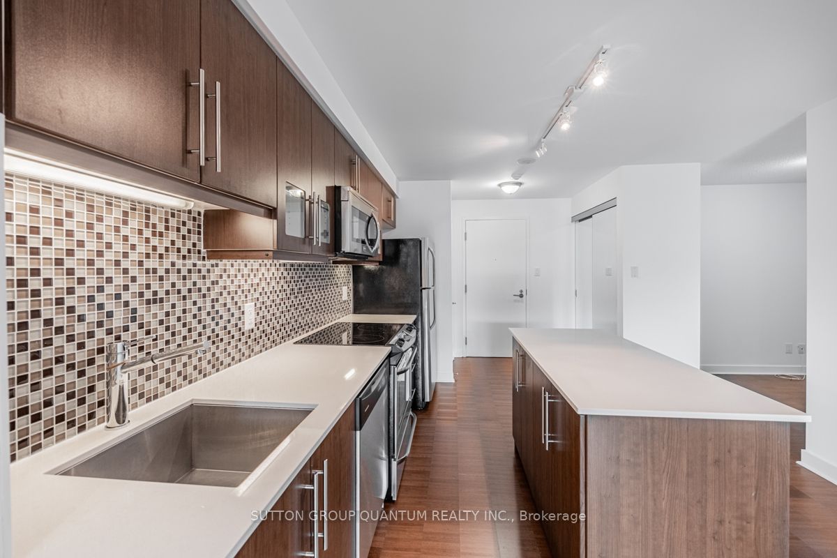 1169 Queen St W, #203