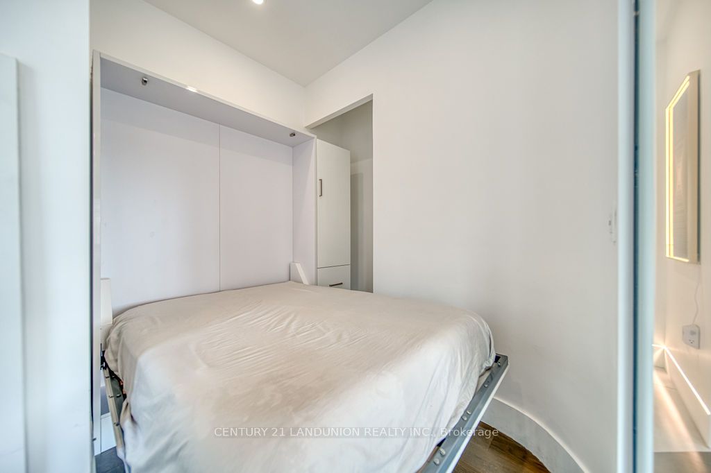 102 Bloor Street W, #203