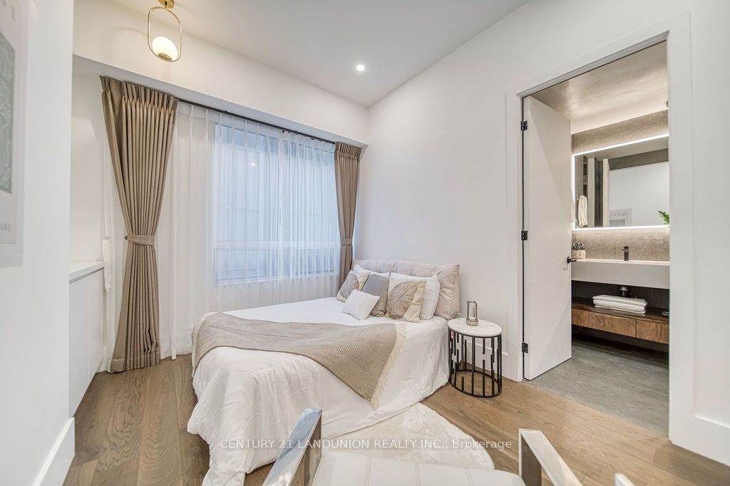 102 Bloor Street W, #203