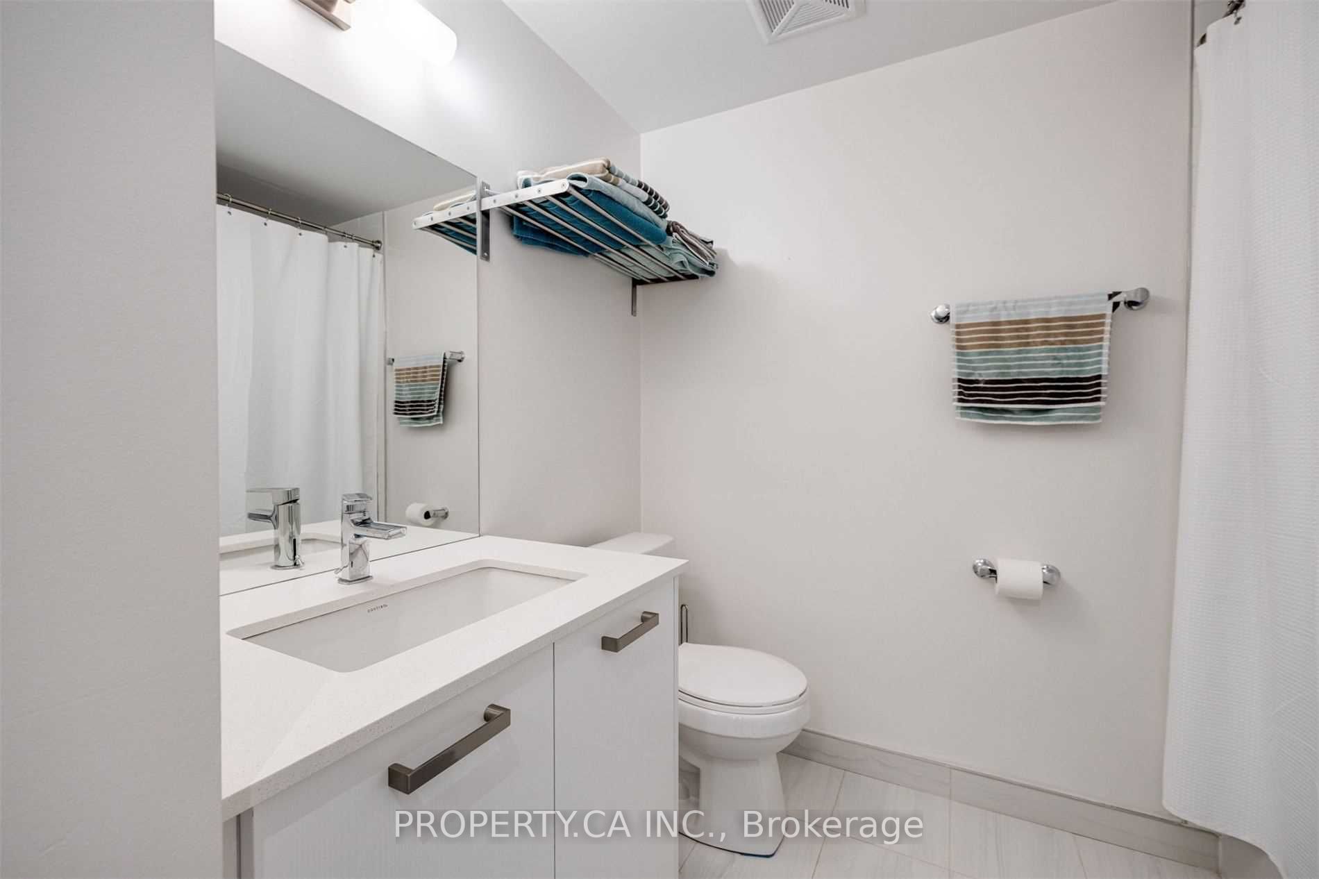 1630 Queen St E, #214