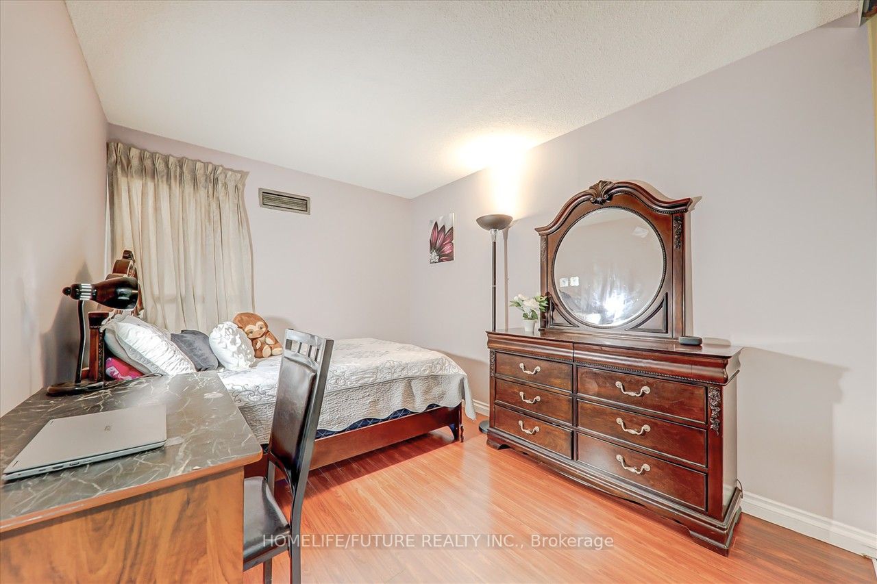 2460 Eglinton Ave E, #203
