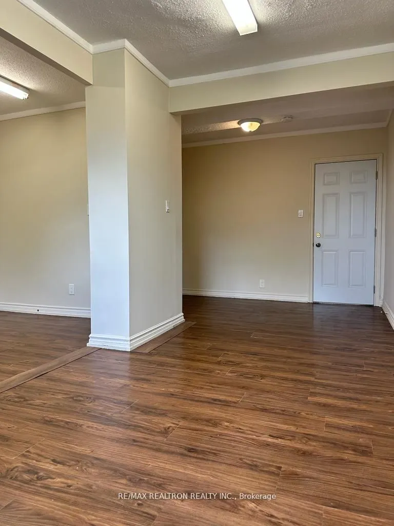 7711 Yonge Street, #201C