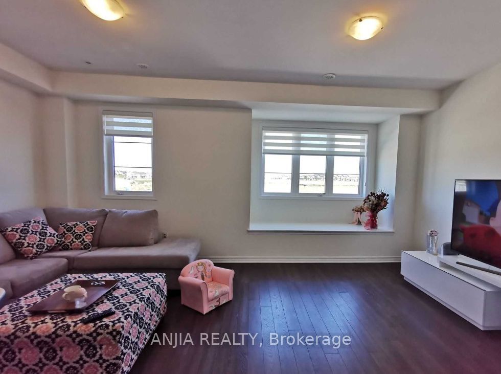 241 Rustle Woods Avenue