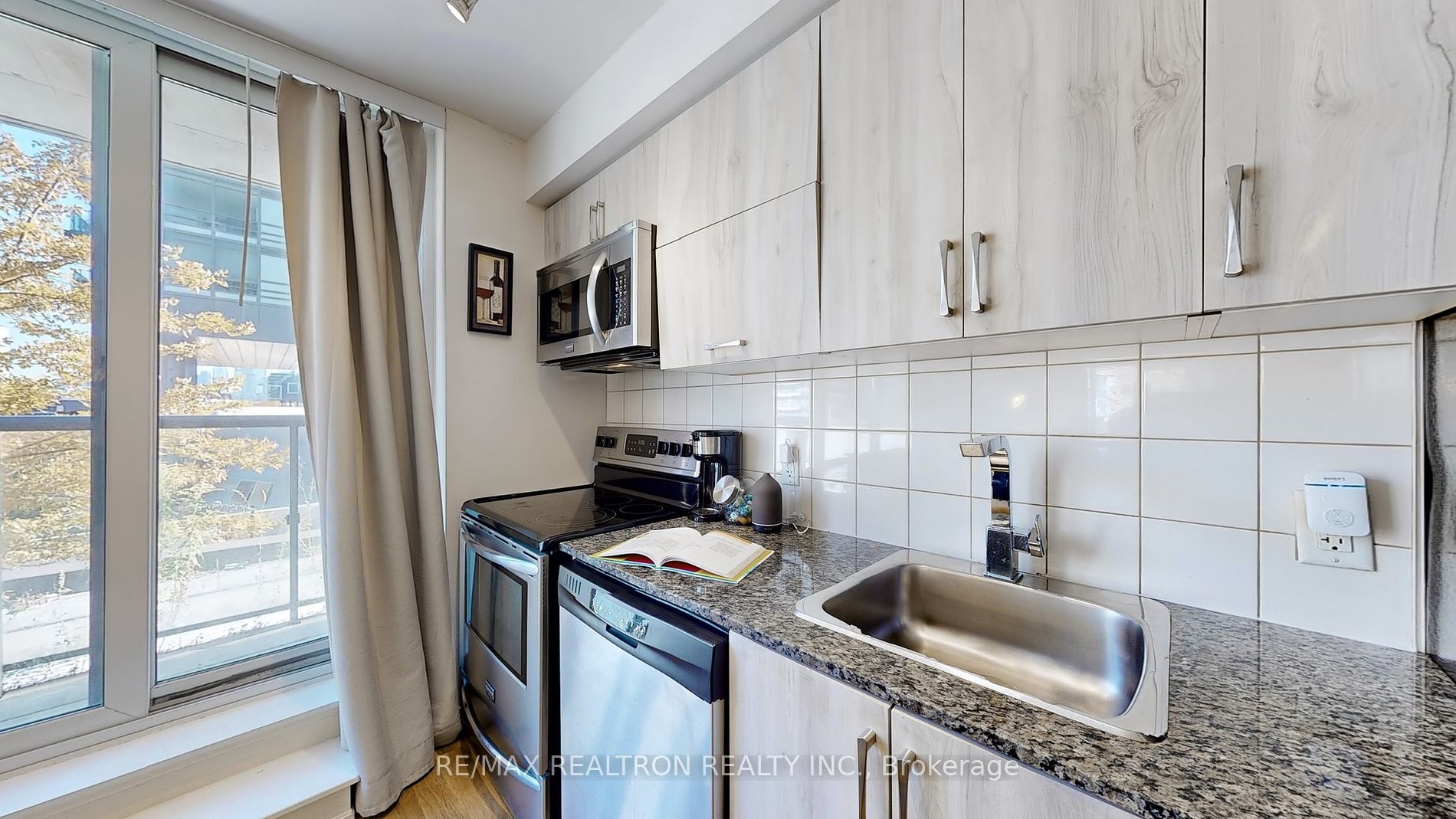 20 Joe Shuster Way, #202