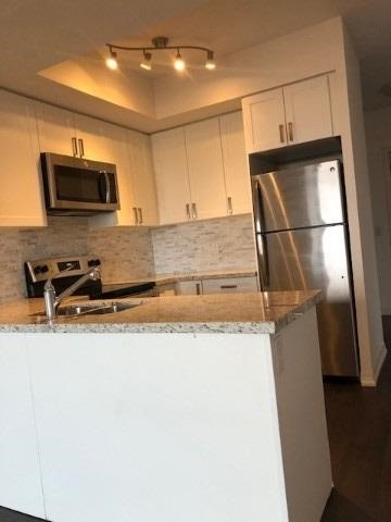 560 North Service Rd, #407