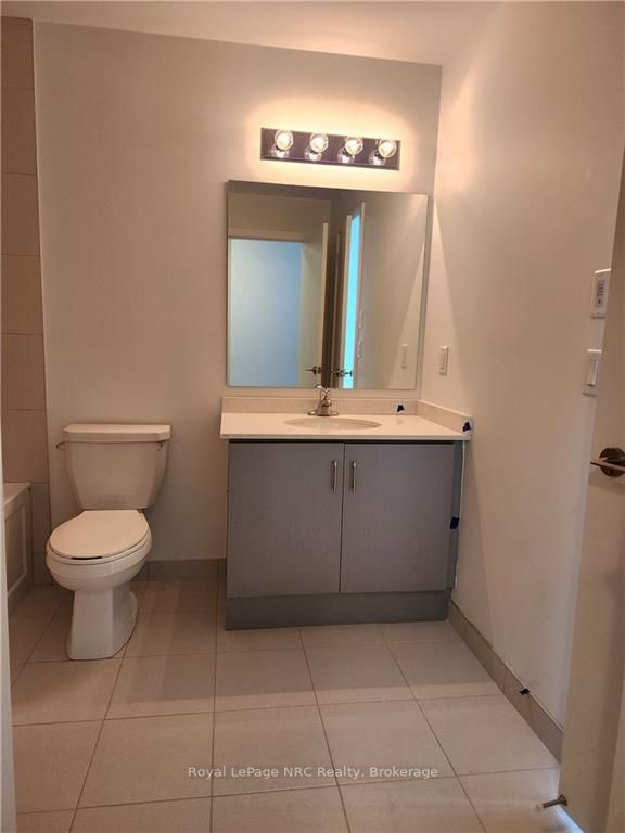 600 North Service Rd, #302
