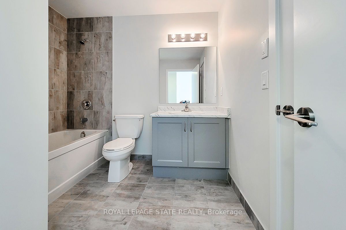 600 North Service Rd S, #402