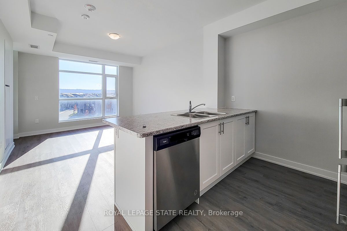 600 North Service Rd S, #402