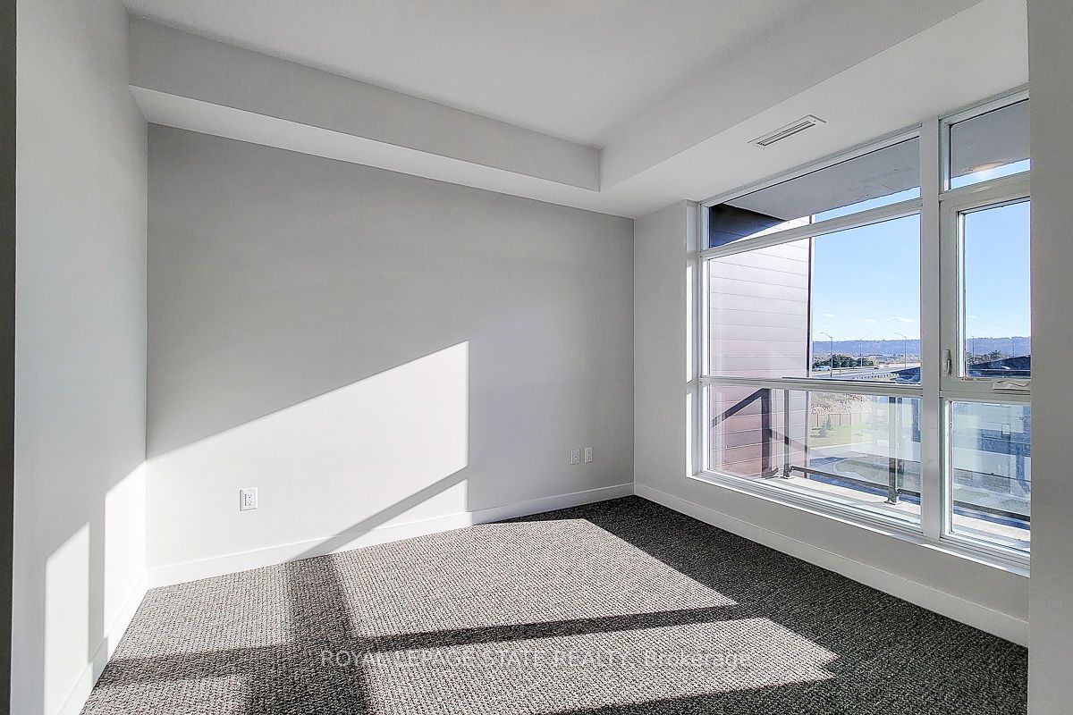 600 North Service Rd S, #402