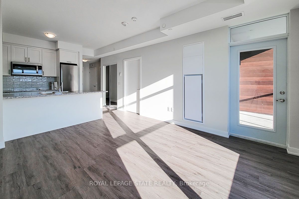 600 North Service Rd S, #402