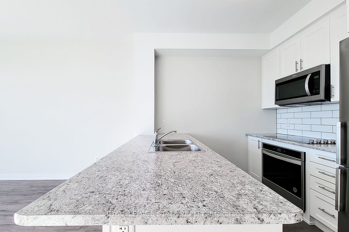 600 North Service Rd S, #402