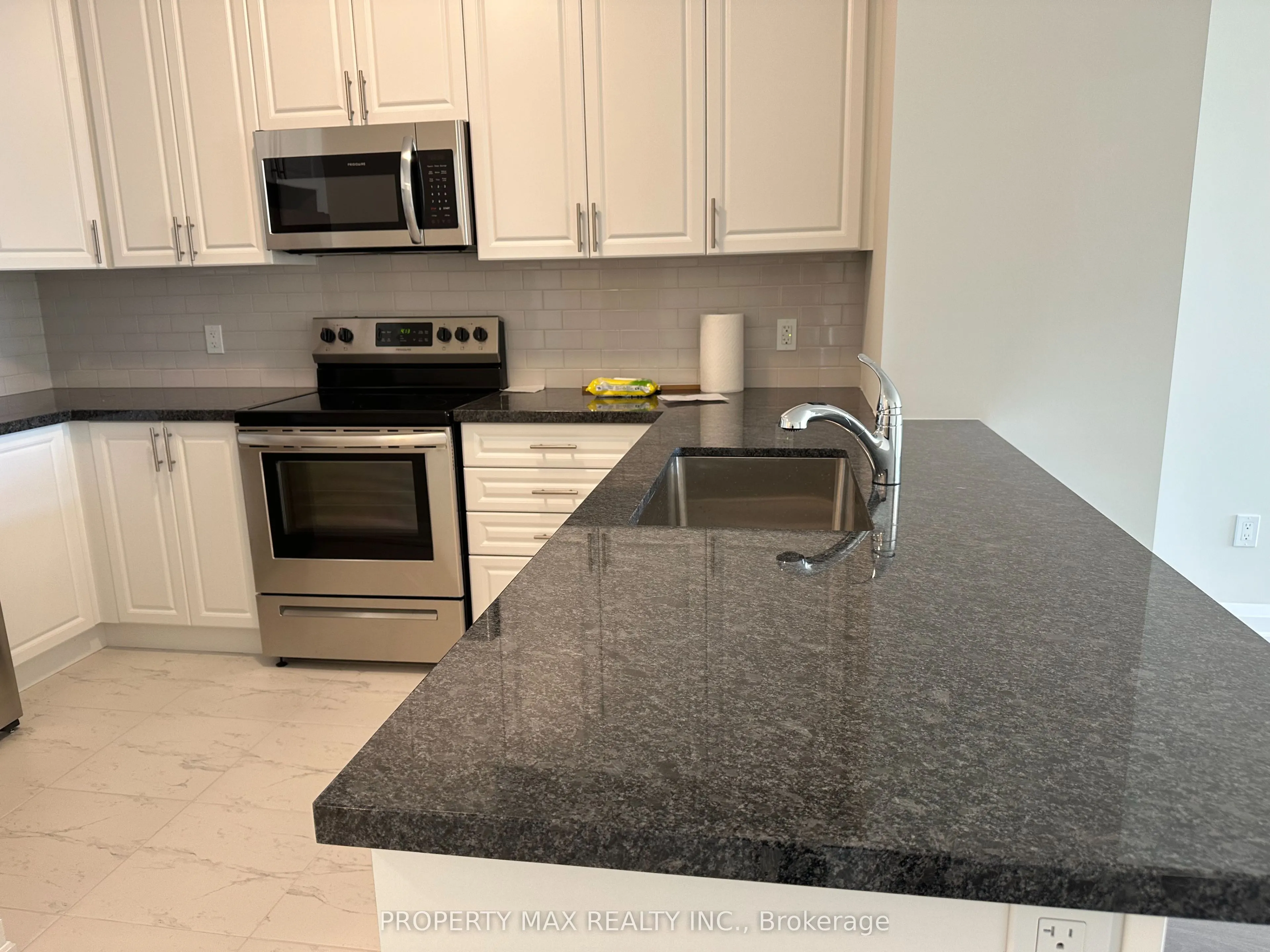 5917 Main Street, #303