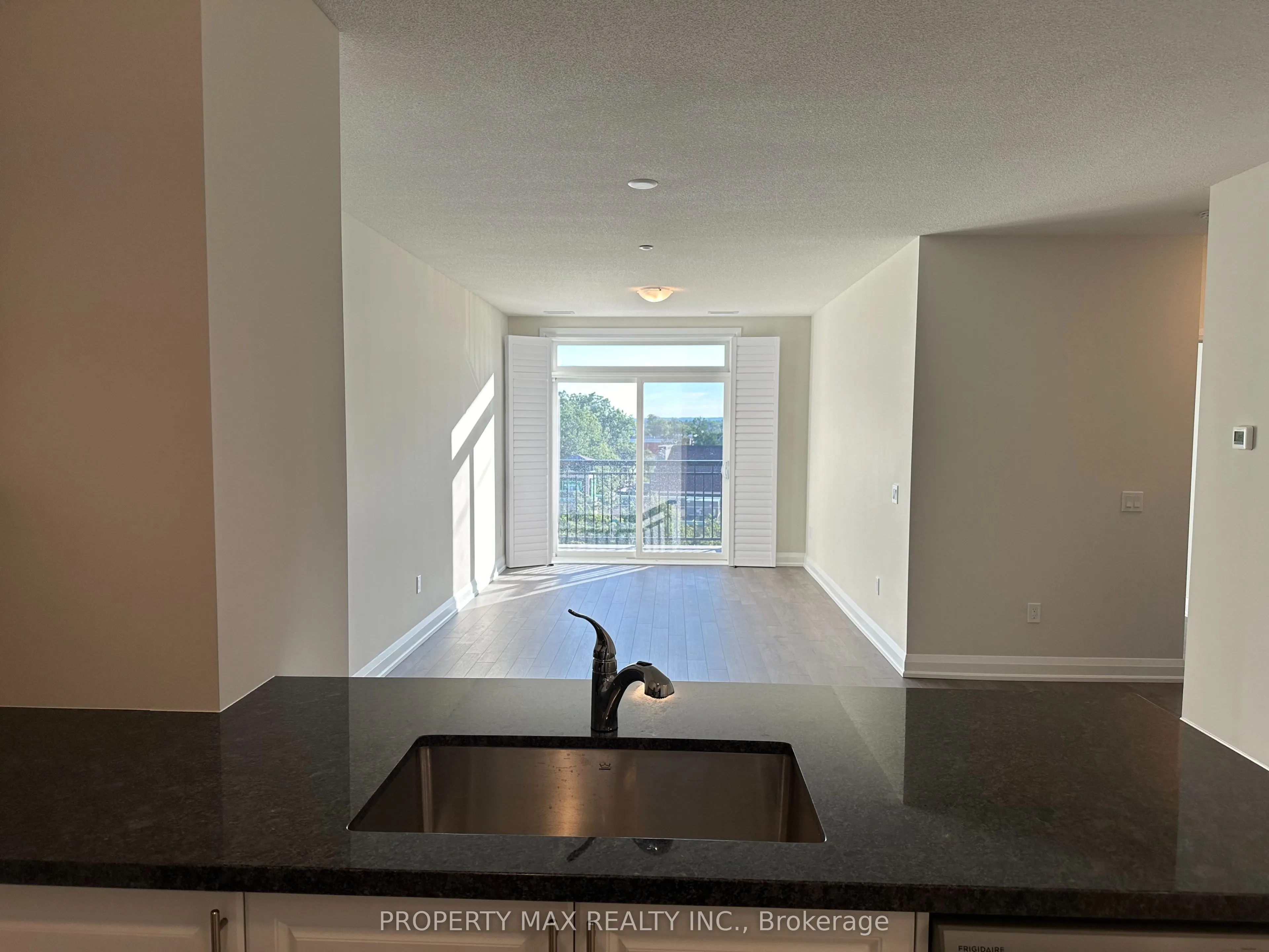 5917 Main Street, #303