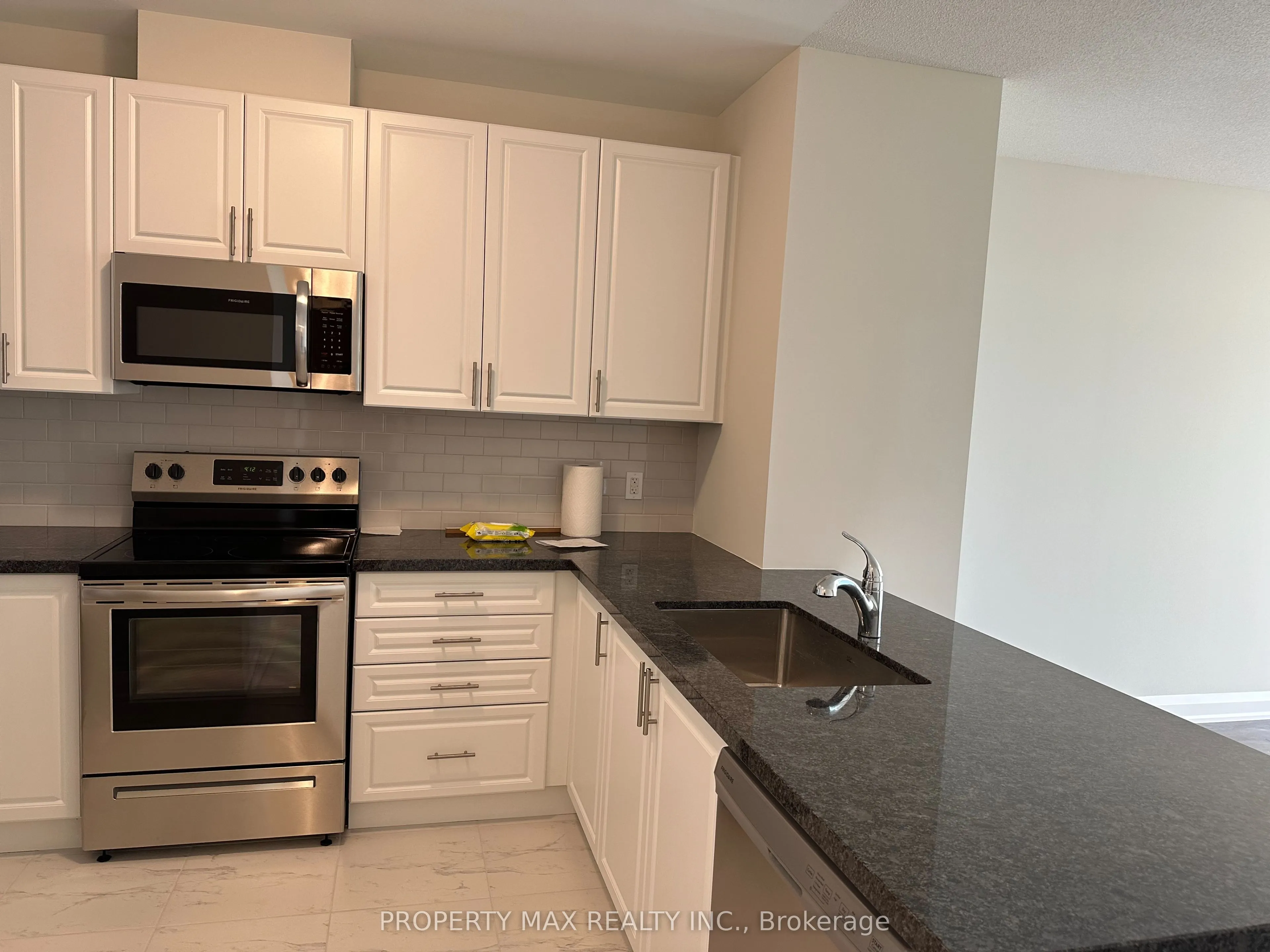 5917 Main Street, #303