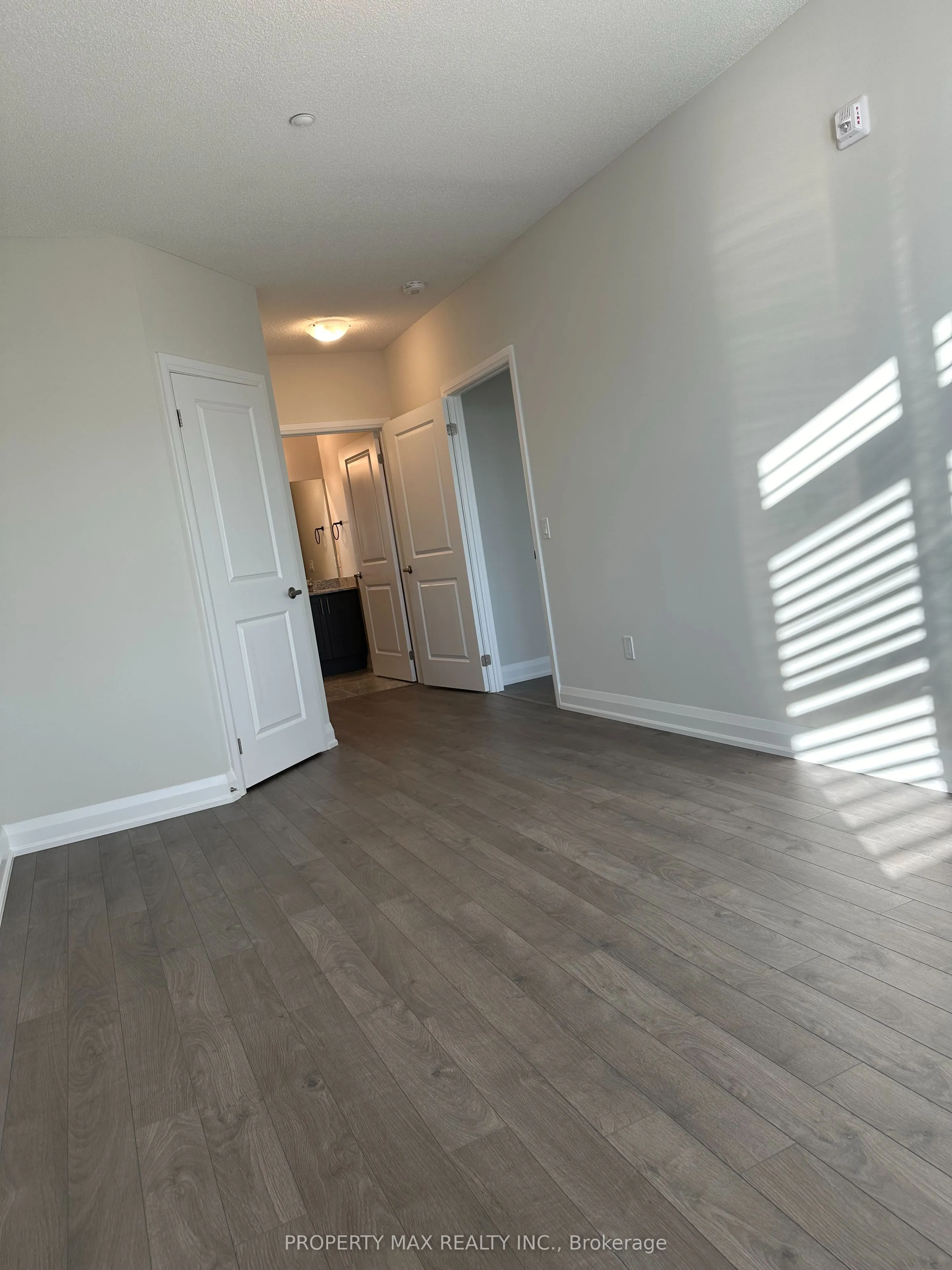 5917 Main Street, #303