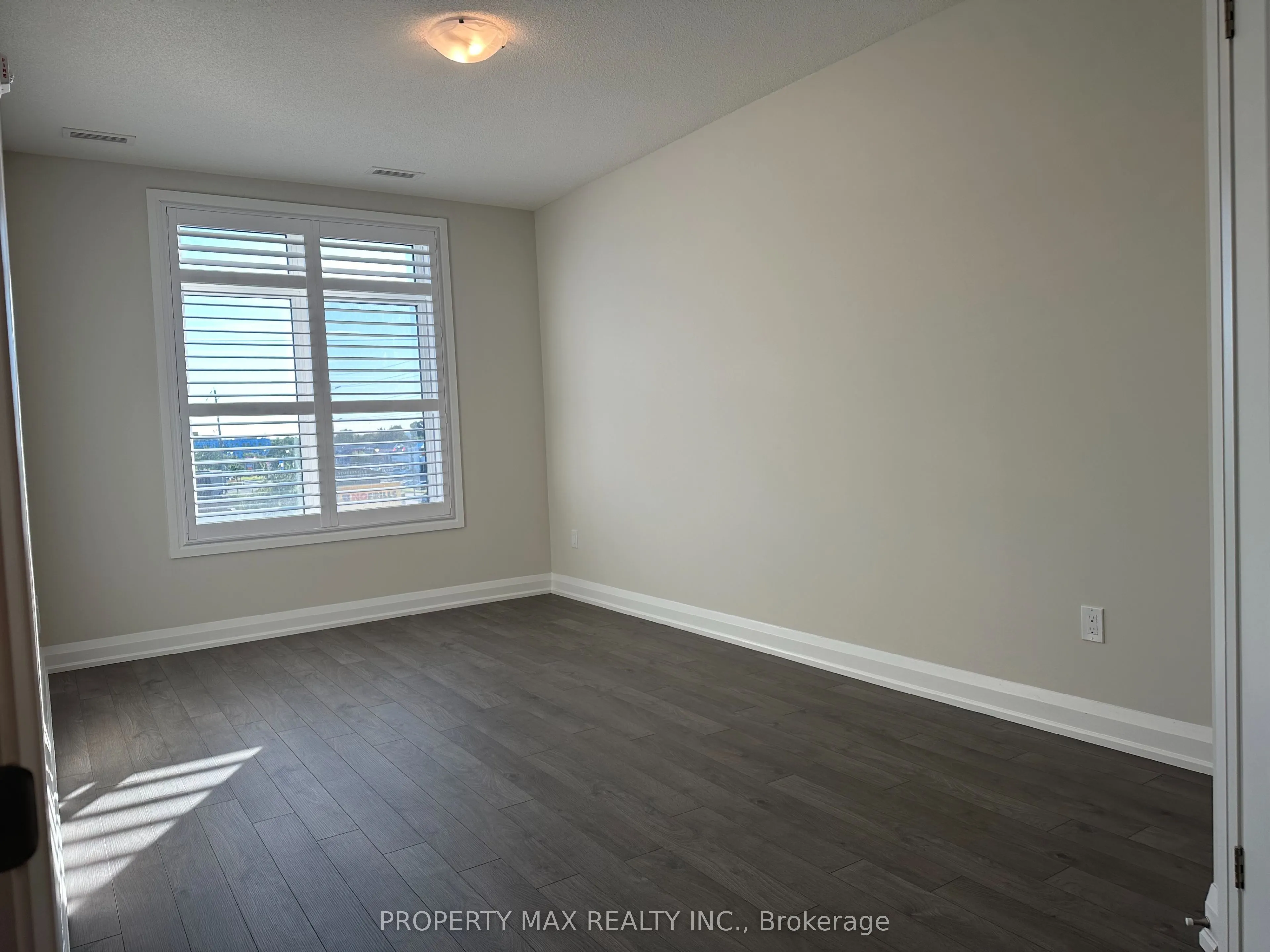 5917 Main Street, #303