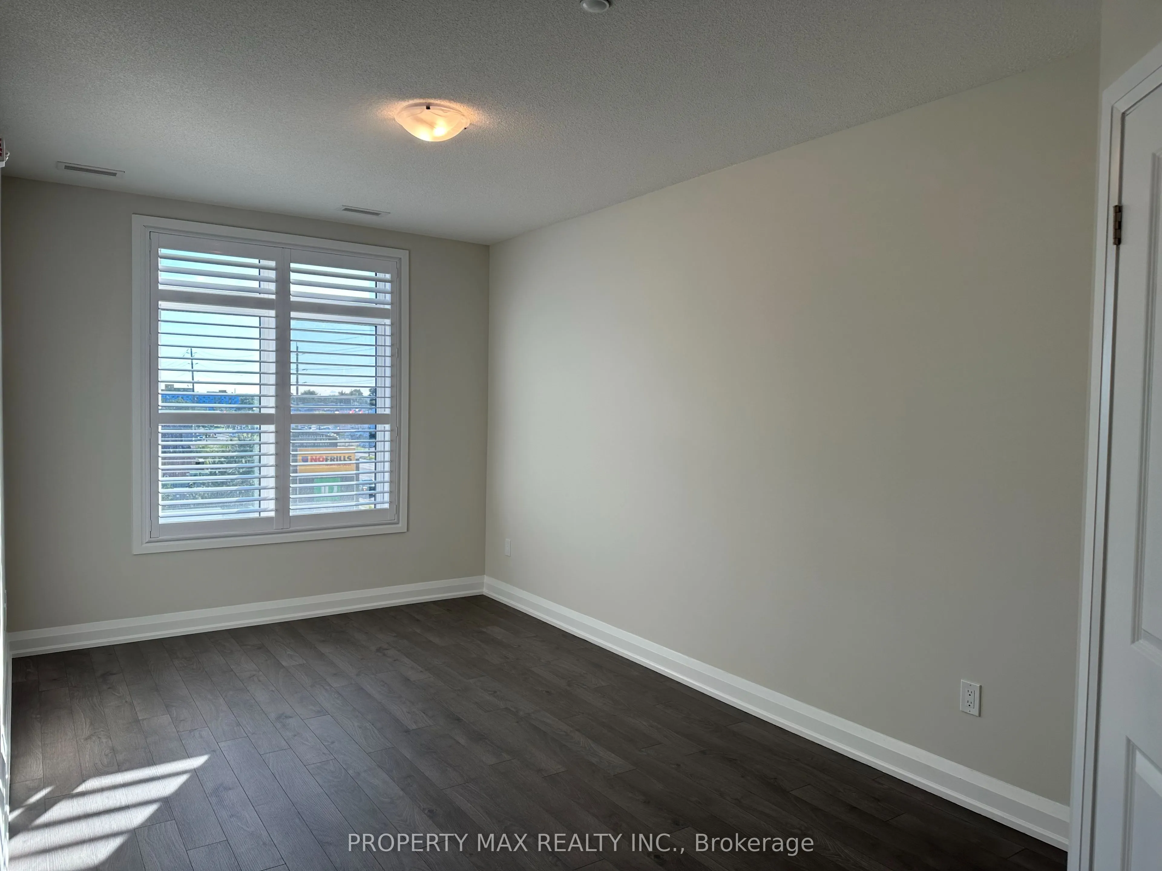 5917 Main Street, #303