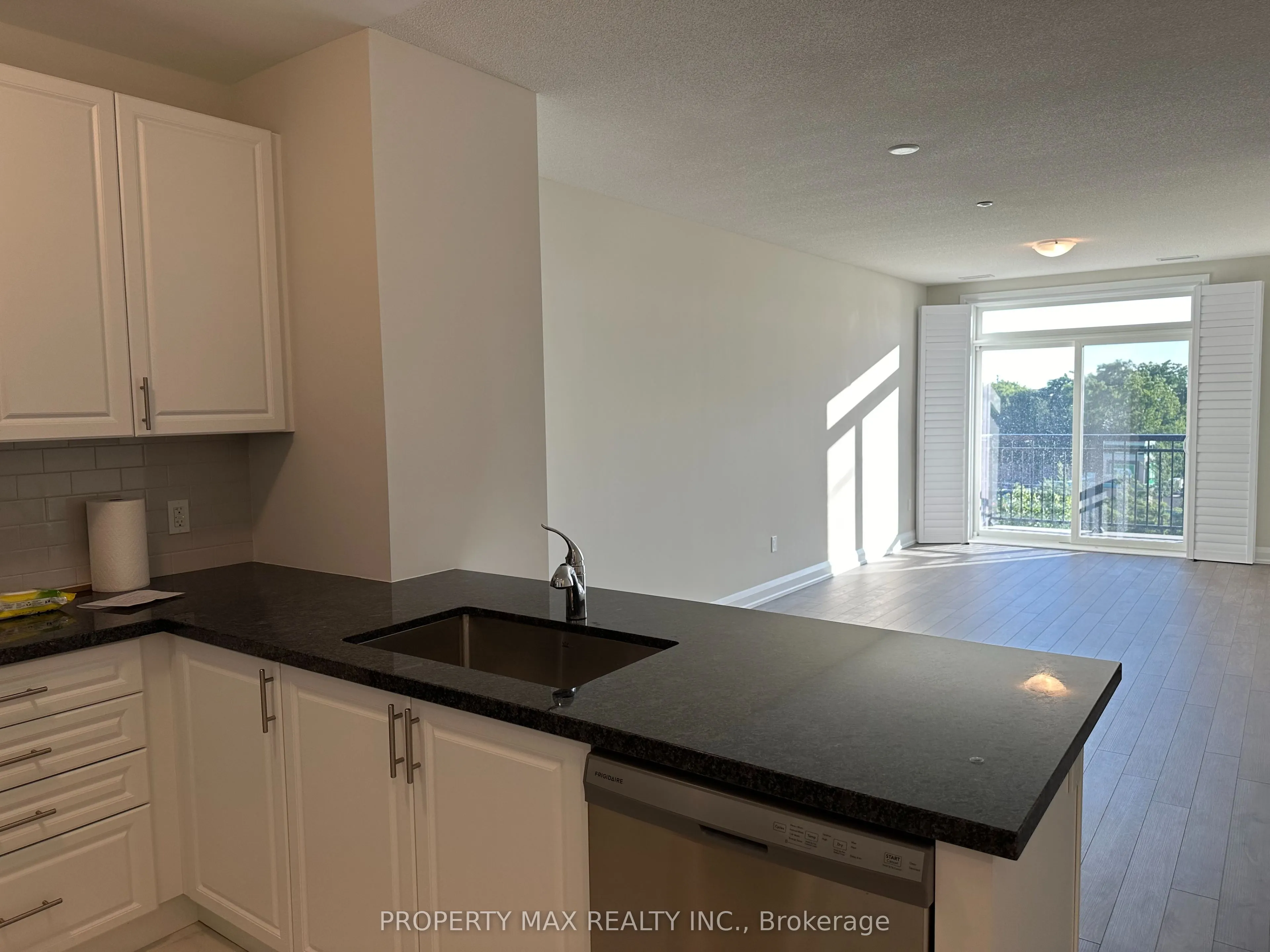 5917 Main Street, #303