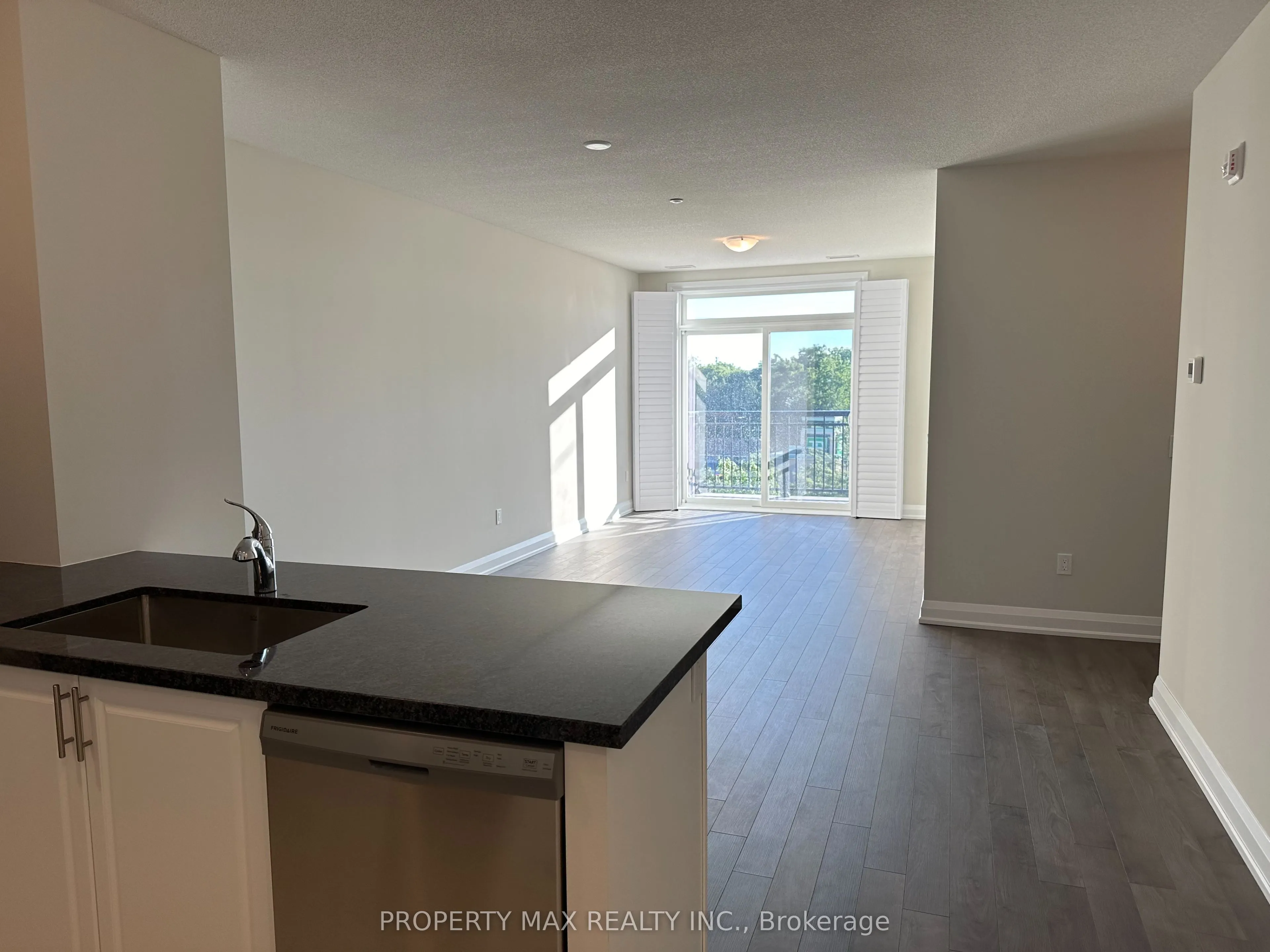 5917 Main Street, #303