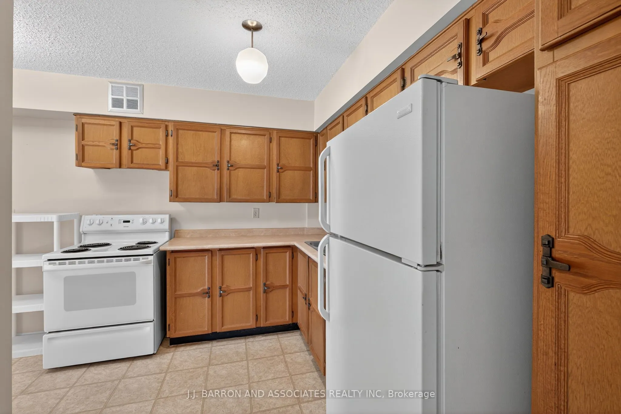 20 William Roe Boulevard, #211