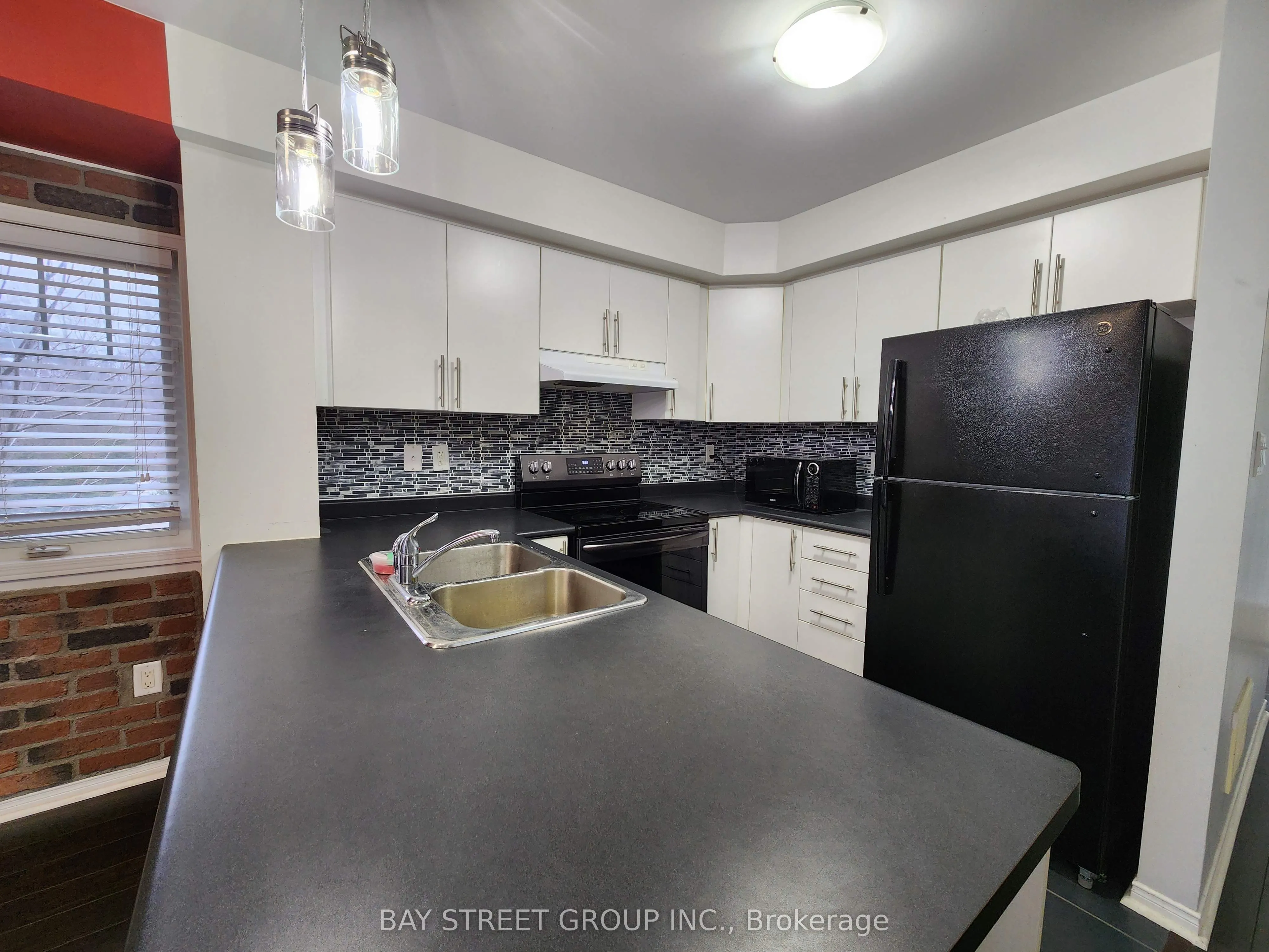 5585 Oscar Peterson Boulevard, #1