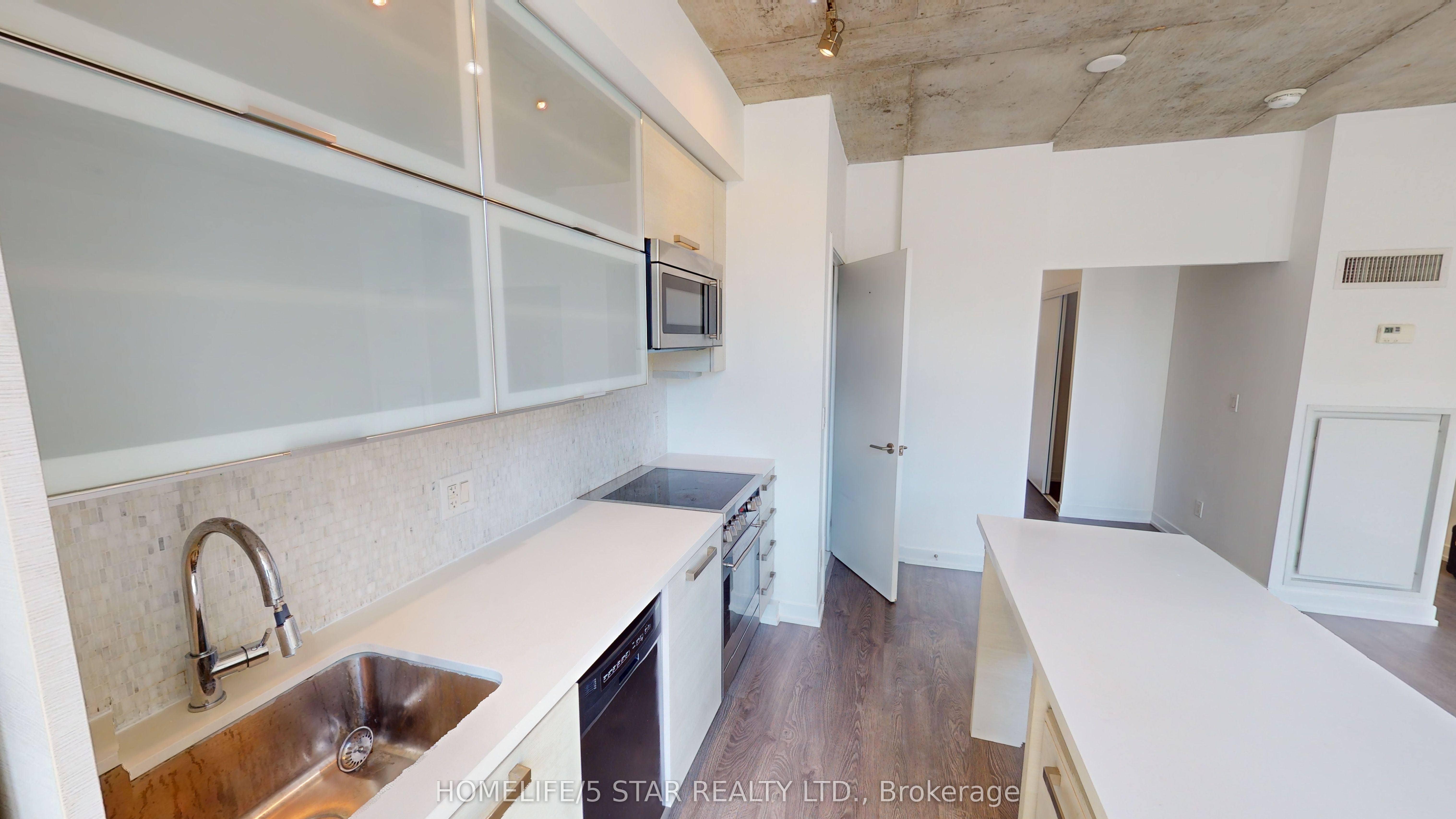 1205 Queen Street W, #203