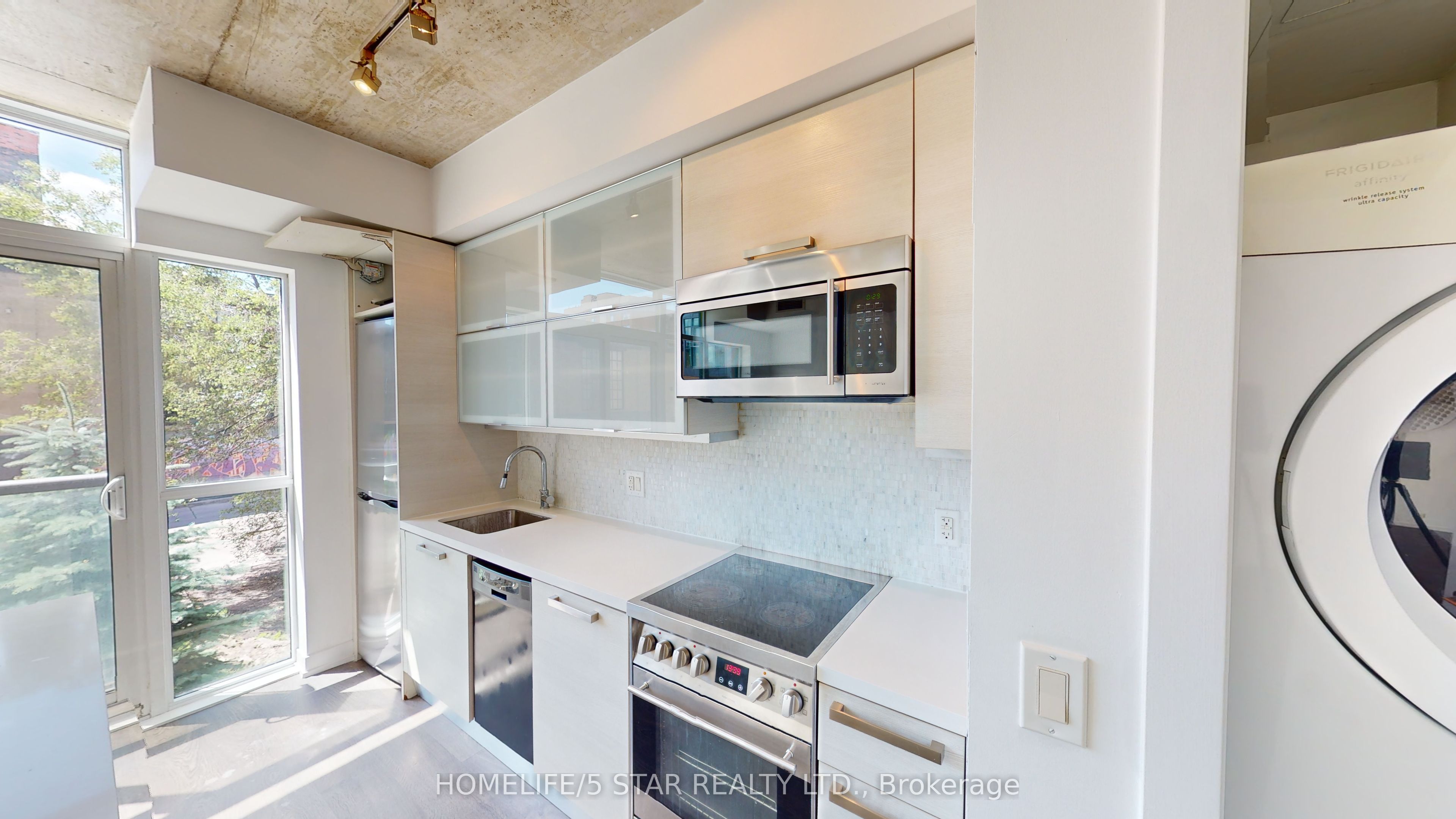1205 Queen Street W, #203