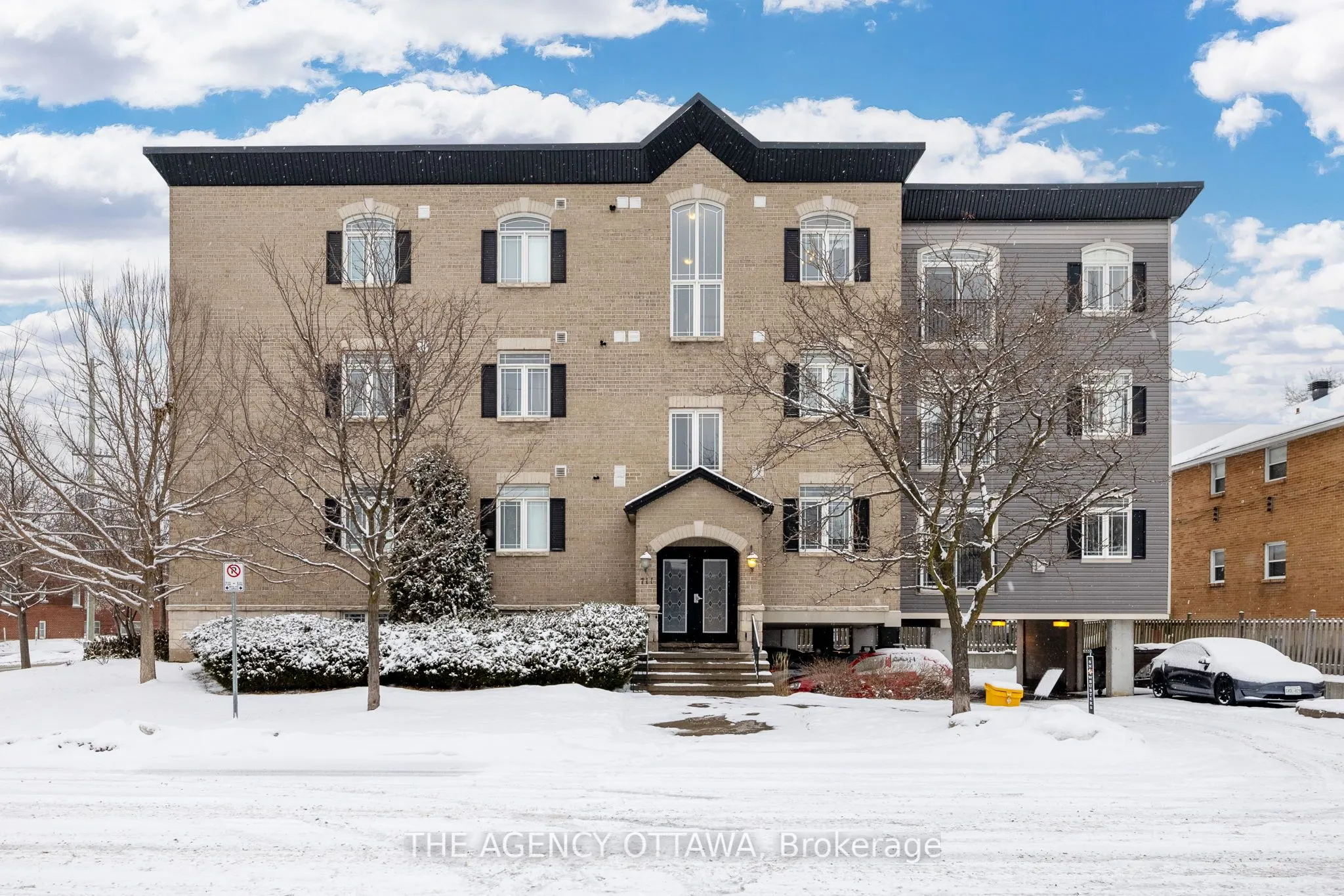 711 CHURCHILL Avenue N #203