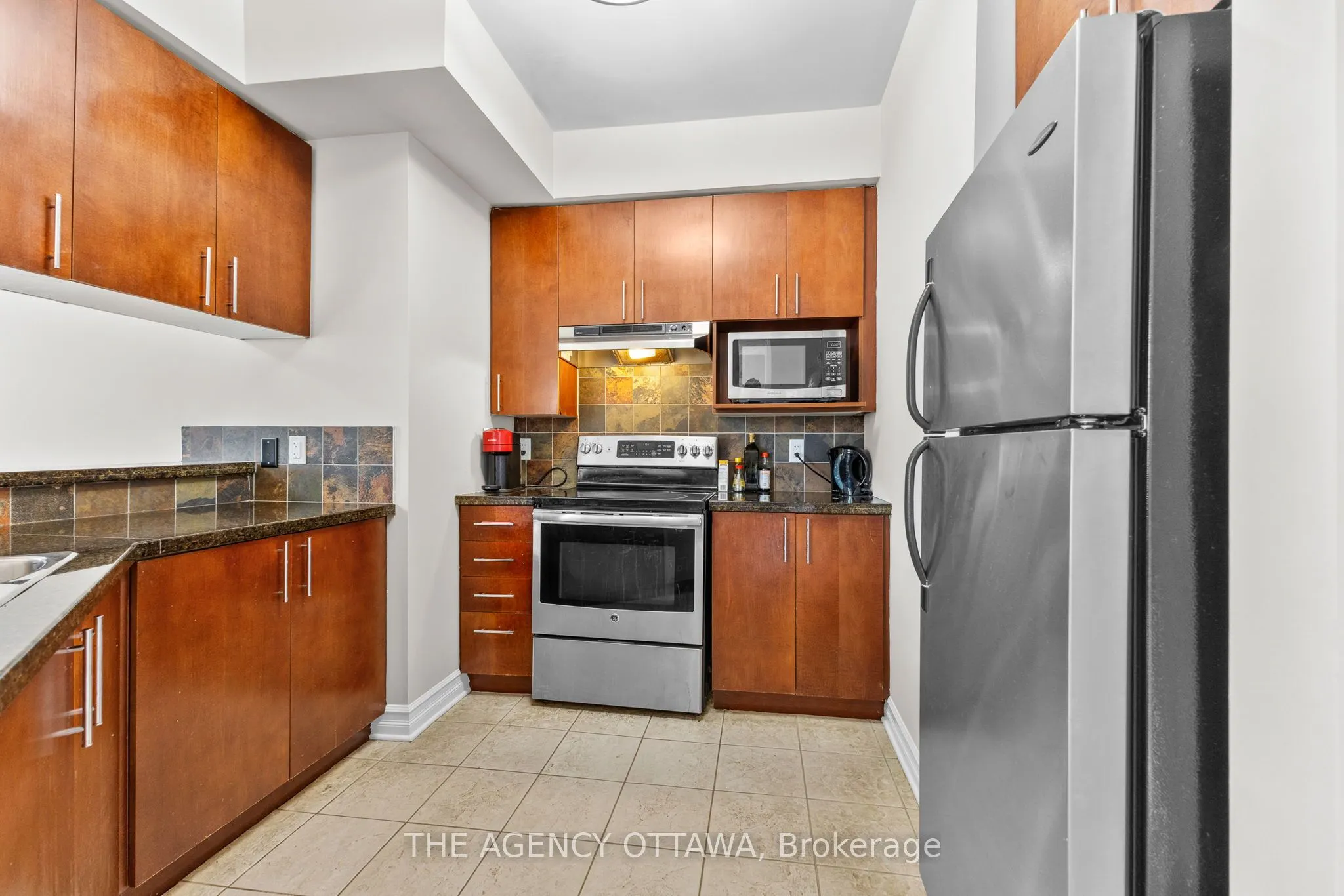 711 CHURCHILL Avenue N #203