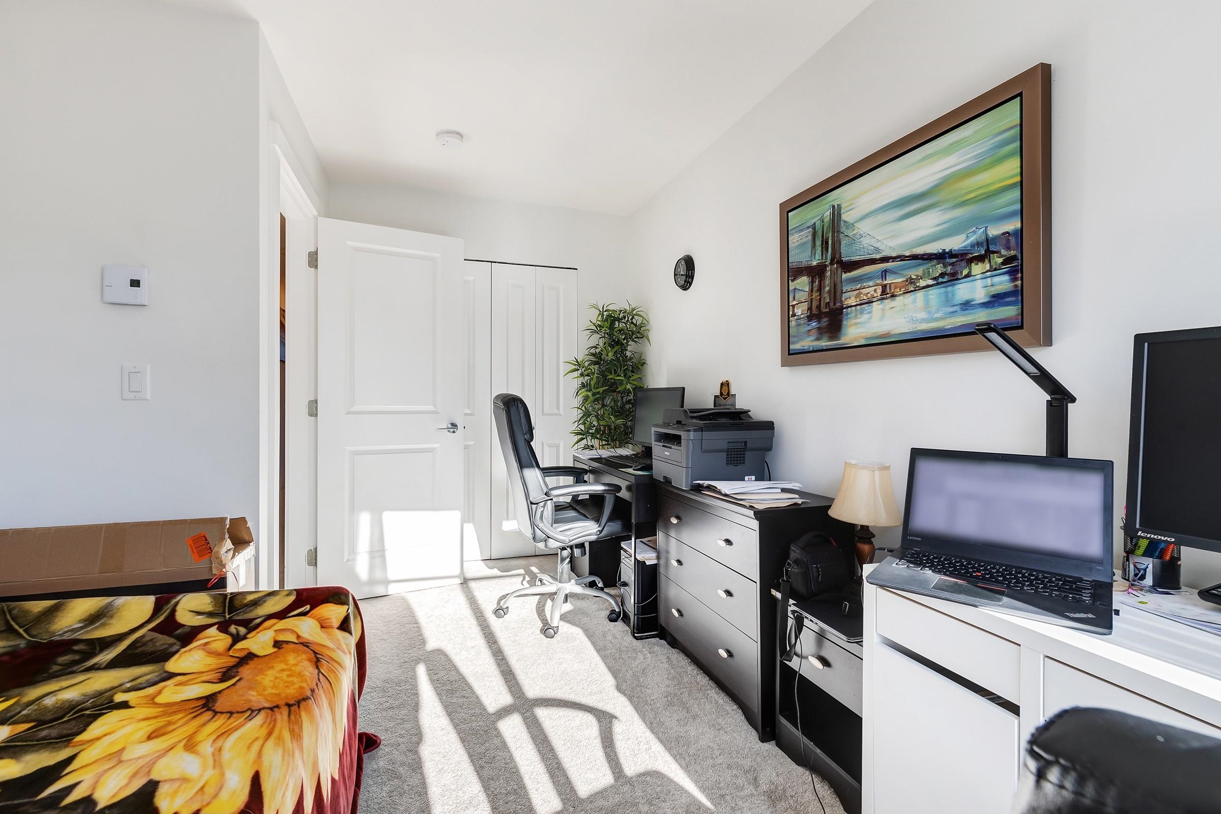 104 9989 E BARNSTON DRIVE, #104