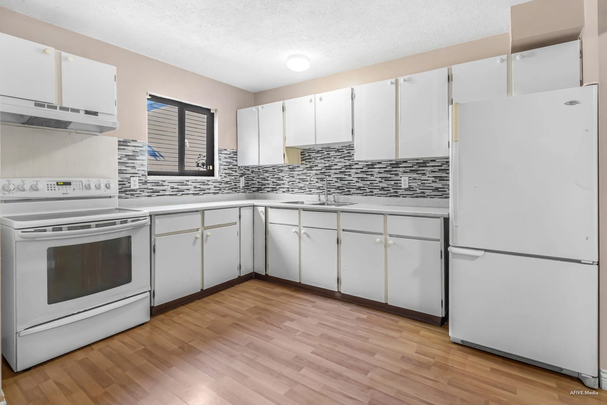 148 13758 67 Avenue