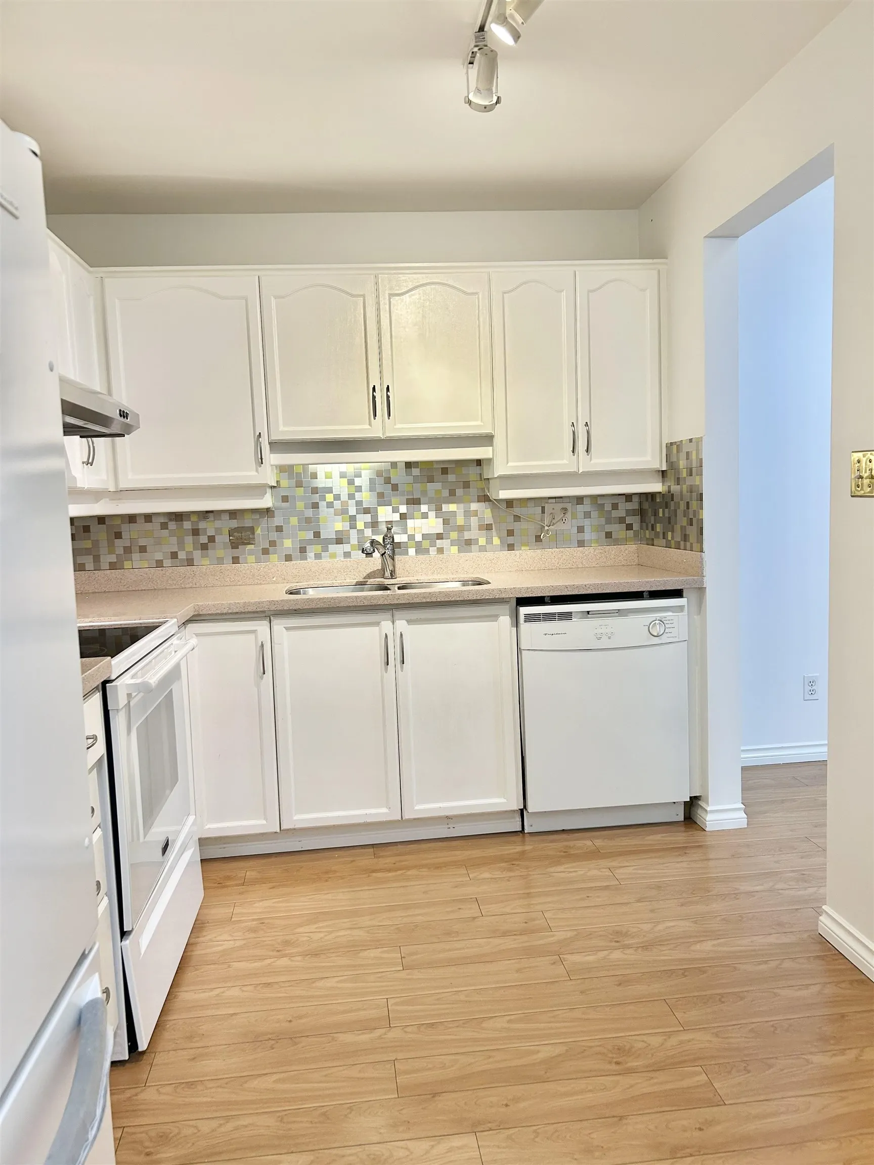 205 6742 Station Hill Court